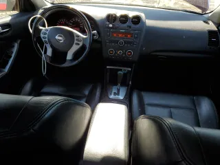 2009 Nissan Altima SL with VIN 1N4AL21E09N523784, listed as a Copart auction lot 53528935 with 168,675 mi miles and Salvage Title. Bid and sale history available at DreamBid. Image 8.