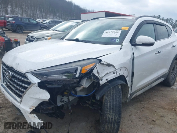 2019 Hyundai Tucson Ultimate with VIN KM8J3CALXKU016834, listed as a IAAI auction lot 40970606 with 104,208 mi miles. Bid and sale history available at carsss.com. Image 6.