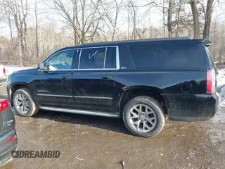 2015 GMC Yukon XL SLT with VIN 1GKS2HKC9FR159164, listed as a IAAI auction lot 41708822 with 136,730 mi miles. Bid and sale history available at carsss.com. Image 14.