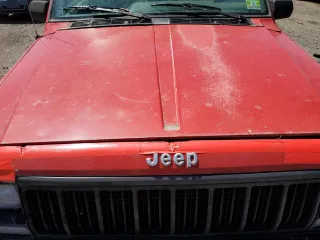 1995 Jeep Cherokee Sport with VIN 1J4FJ67S6SL549912, listed as a Copart auction lot 61104474 with 296,507 mi miles and Clean Title. Bid and sale history available at carsss.com. Image 12.