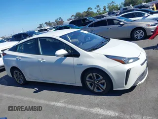 2020 Toyota Prius L Eco with VIN JTDKARFUXL3107211, listed as a IAAI auction lot 42797561 with 328,023 mi miles and . Bid and sale history available at DreamBid. Image 13.