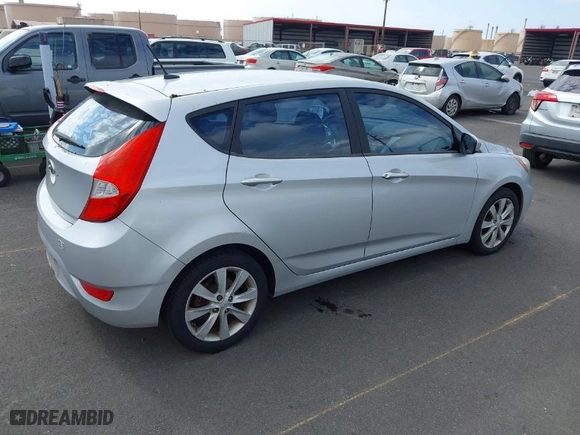 2012 Hyundai Accent SE with VIN KMHCU5AE7CU030632, listed as a IAAI auction lot 41290434 with 98,182 mi miles. Bid and sale history available at carsss.com. Image 4.