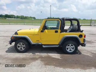 2004 Jeep Wrangler Sport z VIN 1J4FA49S04P701986, wystawiony jako IAAI lot #42256648 z przebiegiem 129 946 mil mil oraz . Historia ofert i sprzedaży dostępna na DreamBid. Obrazek 14.