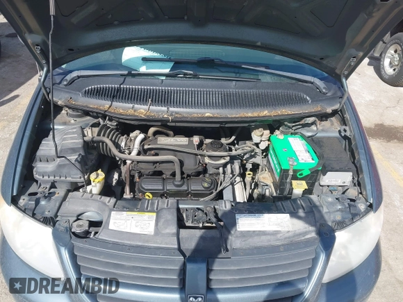 2007 Dodge Caravan SXT with VIN 1D4GP45R57B237884, listed as a IAAI auction lot 41660880 with 120,513 mi miles and . Bid and sale history available at DreamBid. Image 10.