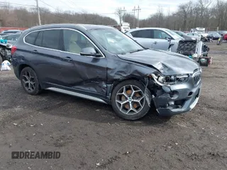 2017 BMW X1 xDrive28i with VIN WBXHT3Z39H4A57753, listed as a IAAI auction lot 41726790 with 52,509 mi miles. Bid and sale history available at carsss.com. Image 1.
