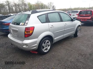 2004 Pontiac Vibe with VIN 5Y2SL64884Z462830, listed as a IAAI auction lot 42032992 with 239,464 mi miles. Bid and sale history available at carsss.com. Image 4.