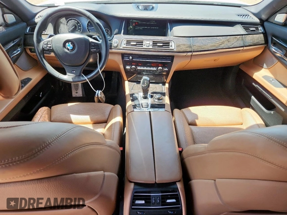 2013 BMW 7 Series 750Li с VIN WBAYE8C59DD134172, выставлен на аукционе Copart как лот 63624785 с пробегом 73 185 миль миль и Списание • Salvage title. История ставок и продаж доступна на DreamBid. Изображение 8.