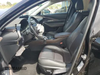 2023 Mazda CX-30 S Premium with VIN 3MVDMBDMXPM527113, listed as a Copart auction lot 57169165 with 49,040 mi miles and Salvage title. Bid and sale history available at DreamBid. Image 7.