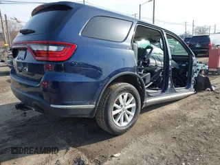 2015 Dodge Durango SXT with VIN 1C4RDJAG0FC101480, listed as a IAAI auction lot 41774278 with Not Provided miles and . Bid and sale history available at DreamBid. Image 4.