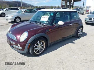 2003 MINI Hardtop with VIN WMWRC33473TC47288, listed as a IAAI auction lot 41881197 with 115,859 mi miles and . Bid and sale history available at DreamBid. Image 2.