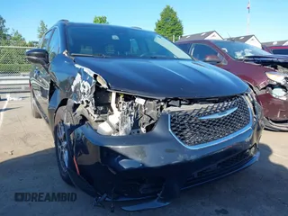 2022 Chrysler Pacifica Touring L with VIN 2C4RC1BG9NR117538, listed as a IAAI auction lot 42318518 with 103,311 mi miles and . Bid and sale history available at DreamBid. Image 6.