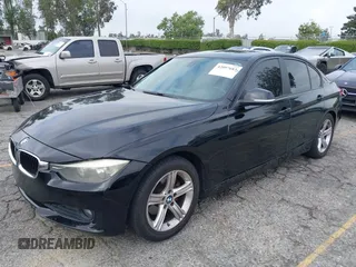 2014 BMW 3 Series 320i with VIN WBA3B1G57ENS80800, listed as a IAAI auction lot 42097683 with 152,924 mi miles. Bid and sale history available at carsss.com. Image 18.