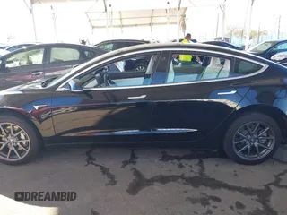 2020 Tesla Model 3 Standard Range Plus with VIN 5YJ3E1EA8LF661982, listed as a IAAI auction lot 41700109 with 30,271 mi miles and . Bid and sale history available at DreamBid. Image 13.
