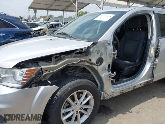 2013 Dodge Journey SXT with VIN 3C4PDCBG9DT506384, listed as a IAAI auction lot 42119685 with 143,769 mi miles. Bid and sale history available at carsss.com. Image 6.