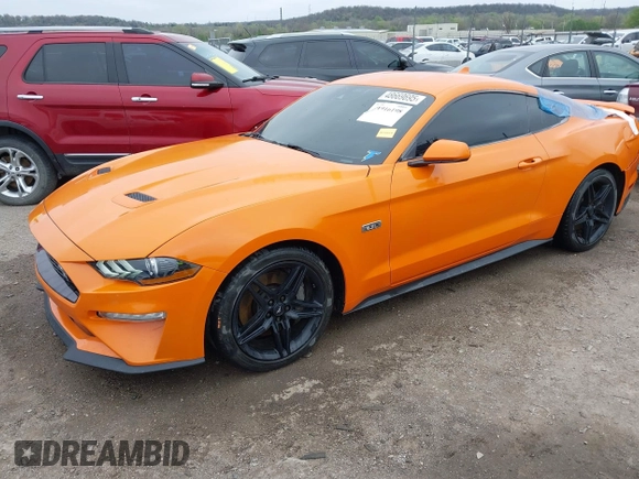 2021 Ford Mustang EcoBoost with VIN 1FA6P8TD5M5151336, listed as a IAAI auction lot 41916198 with 58,990 mi miles and . Bid and sale history available at DreamBid. Image 2.