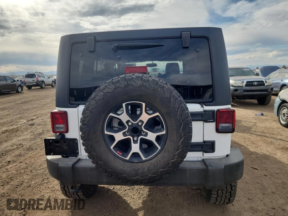 2016 Jeep Wrangler Unlimited Rubicon z VIN 1C4HJWFG6GL315448, wystawiony jako Copart lot #48980755 z przebiegiem 111 612 mil mil oraz Szkoda całkowita • Salvage title. Historia ofert i sprzedaży dostępna na DreamBid. Obrazek 6.