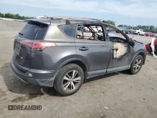 2018 Toyota RAV4 XLE with VIN JTMWFREV2JD125190, listed as a Copart auction lot 60484965 with Not provided miles and Salvage title. Bid and sale history available at DreamBid. Image 3.