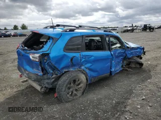 2018 Jeep Cherokee Trailhawk with VIN 1C4PJMBXXJD509312, listed as a Copart auction lot 50838495 with 115,060 mi miles and Salvage Title. Bid and sale history available at carsss.com. Image 3.