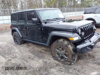 2021 Jeep Wrangler Unlimited Sport S with VIN 1C4HJXDGXMW530060, listed as a IAAI auction lot 41619676 with 61,510 mi miles and . Bid and sale history available at DreamBid. Image 1.