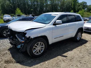 2018 Jeep Grand Cherokee Altitude with VIN 1C4RJFAG9JC200409, listed as a Copart auction lot 61476065 with 165,549 mi miles and Salvage title. Bid and sale history available at DreamBid. Image 1.