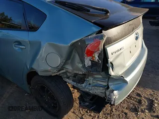 2015 Toyota Prius Four with VIN JTDKN3DU2F1891825, listed as a IAAI auction lot 40701779 with 195,490 mi miles and . Bid and sale history available at DreamBid. Image 6.