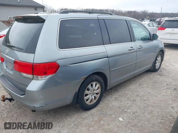 2008 Honda Odyssey EX-L with VIN 5FNRL38748B045957, listed as a IAAI auction lot 41885593 with 212,799 mi miles. Bid and sale history available at carsss.com. Image 4.