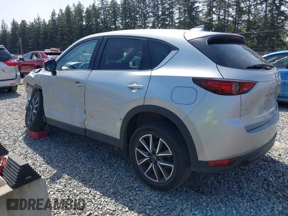 2018 Mazda CX-5 Grand Touring z VIN JM3KFADM7J0318684, wystawiony jako IAAI lot #42226937 z przebiegiem 69 166 mil mil oraz . Historia ofert i sprzedaży dostępna na DreamBid. Obrazek 3.