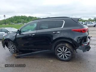 2018 Kia Sportage EX z VIN KNDPN3AC8J7382796, wystawiony jako IAAI lot #42161431 z przebiegiem 42 666 mil mil oraz . Historia ofert i sprzedaży dostępna na DreamBid. Obrazek 14.
