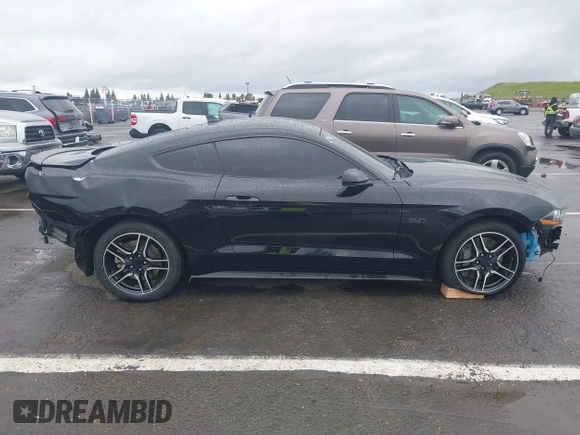 2021 Ford Mustang GT z VIN 1FA6P8CF3M5154673, wystawiony jako IAAI lot #41933201 z przebiegiem 53 757 mil mil oraz . Historia ofert i sprzedaży dostępna na DreamBid. Obrazek 14.