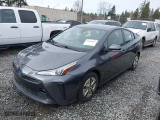 2021 Toyota Prius L Eco with VIN JTDKAMFU2M3143138, listed as a IAAI auction lot 41658263 with 102,718 mi miles. Bid and sale history available at carsss.com. Image 17.