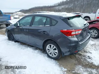 2018 Subaru Impreza with VIN 4S3GTAA67J3745553, listed as a IAAI auction lot 41296165 with 79,211 mi miles. Bid and sale history available at carsss.com. Image 3.