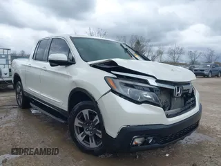 2017 Honda Ridgeline RTL-T z VIN 5FPYK3F63HB002582, wystawiony jako IAAI lot #42017655 z przebiegiem 193 627 mil mil oraz . Historia ofert i sprzedaży dostępna na DreamBid. Obrazek 1.