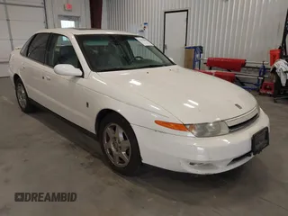 2002 Saturn LS z VIN 1G8JW54RX2Y581918, wystawiony jako IAAI lot #42291899 z przebiegiem 152 706 mil mil oraz . Historia ofert i sprzedaży dostępna na DreamBid. Obrazek 1.