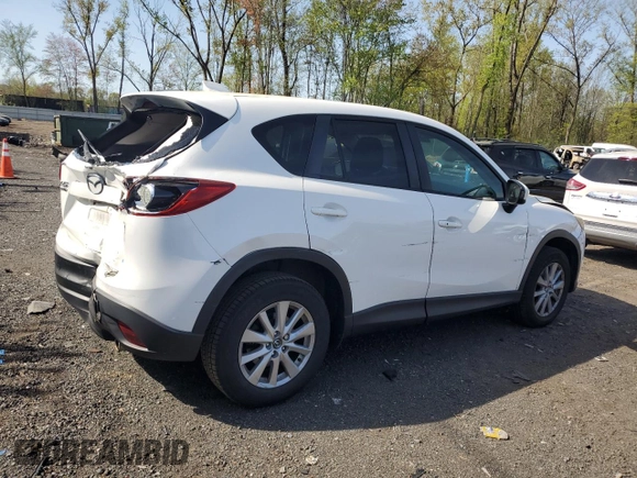 2015 Mazda CX-5 Touring with VIN JM3KE4CYXF0445980, listed as a Copart auction lot 55224355 with 183,713 mi miles and Salvage Title. Bid and sale history available at DreamBid. Image 3.