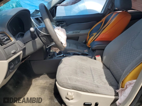 2012 Ford Fusion SE with VIN 3FAHP0HA3CR167698, listed as a Copart auction lot 55909695 with 128,025 mi miles and Salvage title. Bid and sale history available at DreamBid. Image 7.