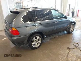 2003 BMW X5 4.4i with VIN 5UXFB33573LH46415, listed as a IAAI auction lot 41442213 with 145,290 mi miles. Bid and sale history available at carsss.com. Image 4.