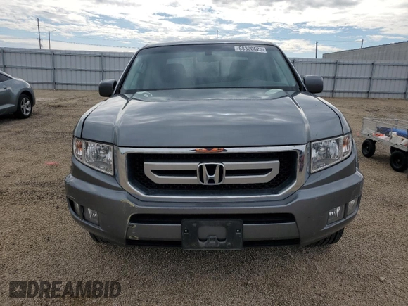 2009 Honda Ridgeline RTL z VIN 5FPYK16569B103645, wystawiony jako Copart lot #58300625 z przebiegiem 103 195 mil mil oraz Szkoda całkowita • Salvage title. Historia ofert i sprzedaży dostępna na DreamBid. Obrazek 5.