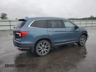 2022 Honda Pilot Touring 7-Passenger z VIN 5FNYF5H63NB015091, wystawiony jako Copart lot #56323725 z przebiegiem 28 614 mil mil oraz Szkoda całkowita • Salvage title. Historia ofert i sprzedaży dostępna na DreamBid. Obrazek 3.