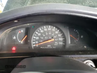 1999 Toyota Tacoma z VIN 4TANL42N6XZ561222, wystawiony jako Copart lot #45721925 z przebiegiem 221 521 mil mil oraz Szkoda całkowita • Salvage title. Historia ofert i sprzedaży dostępna na DreamBid. Obrazek 9.