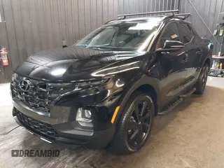 2023 Hyundai Santa Cruz Night Edition z VIN 5NTJCDAF0PH059683, wystawiony jako IAAI lot #42075765 z przebiegiem 25 077 mil mil oraz . Historia ofert i sprzedaży dostępna na DreamBid. Obrazek 22.