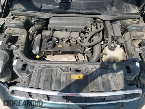 2012 MINI Countryman S with VIN WMWZC5C54CWL57554, listed as a Copart auction lot 59699865 with 144,737 mi miles and Salvage title. Bid and sale history available at DreamBid. Image 11.