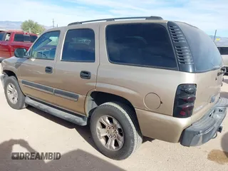 2005 Chevrolet Tahoe LS with VIN 1GNEC13V25R204089, listed as a IAAI auction lot 41075336 with 164,937 mi miles and . Bid and sale history available at DreamBid. Image 3.