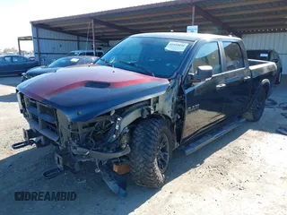 2017 Ram 1500 Rebel z VIN 1C6RR7YT5HS811773, wystawiony jako IAAI lot #41410030 z przebiegiem 96 418 mil mil oraz . Historia ofert i sprzedaży dostępna na DreamBid. Obrazek 2.