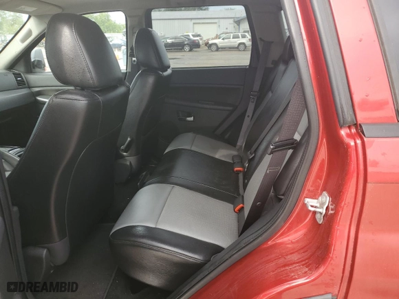 2010 Jeep Grand Cherokee Laredo with VIN 1J4PR4GK6AC122827, listed as a Copart auction lot 69482584 with 154,113 mi miles and Non Repairable. Bid and sale history available at carsss.com. Image 10.