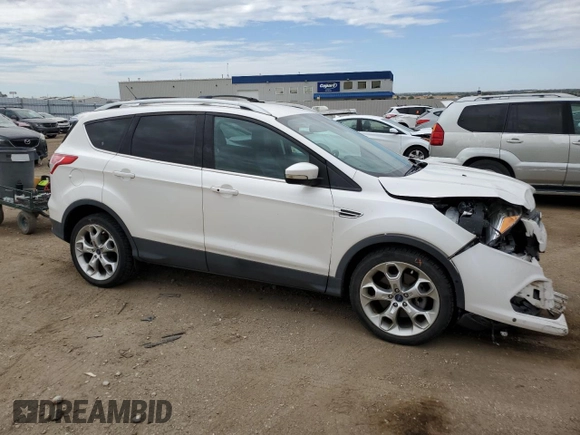 2013 Ford Escape Titanium with VIN 1FMCU0J90DUB90746, listed as a Copart auction lot 72767464 with 67,388 mi miles and Salvage Title. Bid and sale history available at carsss.com. Image 4.