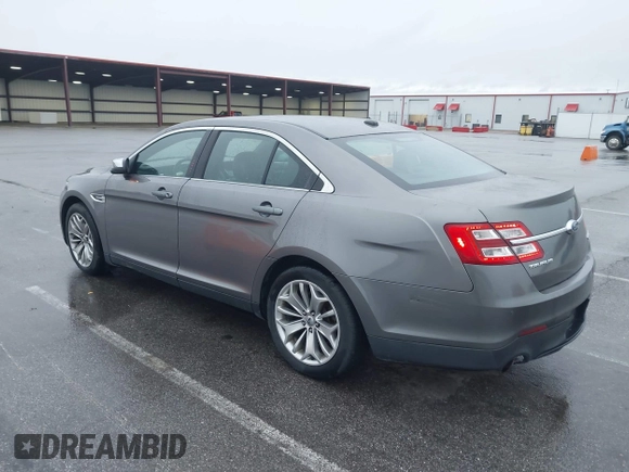 2013 Ford Taurus Limited with VIN 1FAHP2F81DG206437, listed as a IAAI auction lot 41942116 with 194,336 mi miles. Bid and sale history available at carsss.com. Image 3.