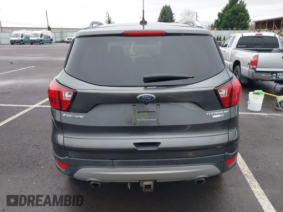 2019 Ford Escape Titanium with VIN 1FMCU9J99KUA64158, listed as a IAAI auction lot 41980102 with 52,514 mi miles. Bid and sale history available at carsss.com. Image 17.
