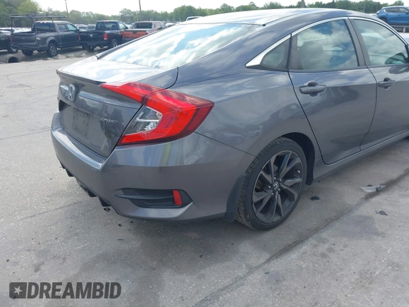 2019 Honda Civic Sedan Sport with VIN 19XFC2F8XKE035939, listed as a IAAI auction lot 42032928 with 84,414 mi miles. Bid and sale history available at carsss.com. Image 4.