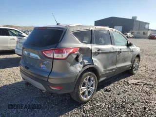 2014 Ford Escape Titanium with VIN 1FMCU9J90EUD94405, listed as a Copart auction lot 68489754 with 52,045 mi miles and Salvage Title. Bid and sale history available at DreamBid. Image 3.