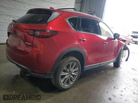 2021 Mazda CX-5 Grand Touring with VIN JM3KFBDM8M0434857, listed as a Copart auction lot 47286545 with Not Provided miles and Salvage Title. Bid and sale history available at DreamBid. Image 3.